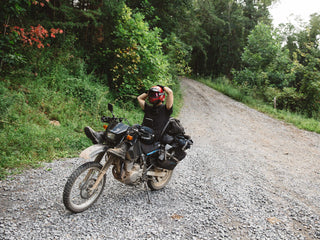 under open air resting on motorcycle